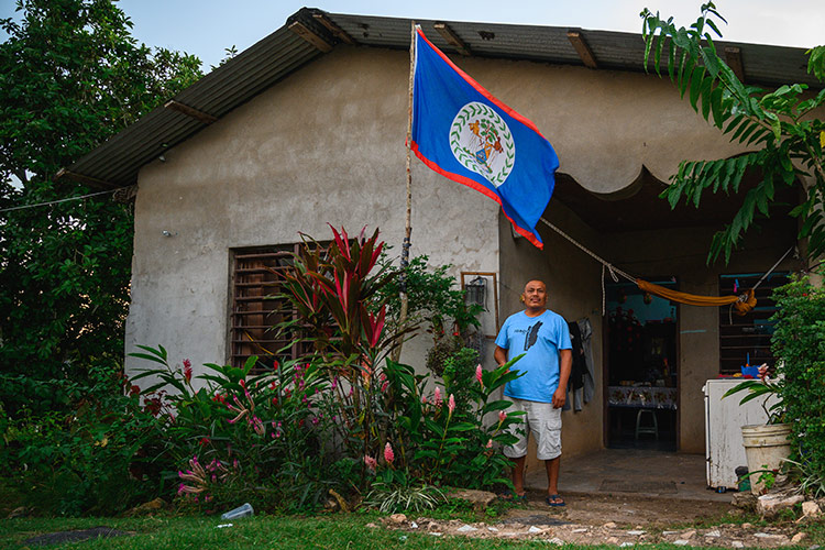 man in front of home in Belize