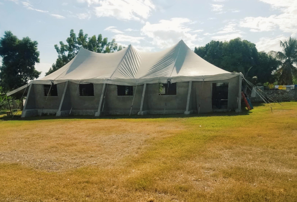 Poverty Resolutions staff members felt called by God to start a church in order to meet the spiritual needs of their community. It started out in a tent but was quickly outgrown. That original tent was replaced by a circus-sized tent and in 2018 a permanent building was erected. This space is multifunctional for the community - used for Sunday morning services, midweek Bible studies, evening worship revivals, weddings, funerals and many other events. Pastor Samuel dreams of church planting and someday opening a Bible seminary as well.